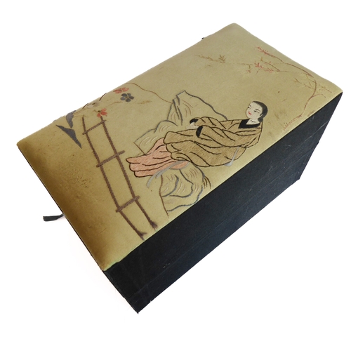 103 - A dome-topped jewellery box: hand-stitched decoration of a seated Geisha before a fence with flowers... 