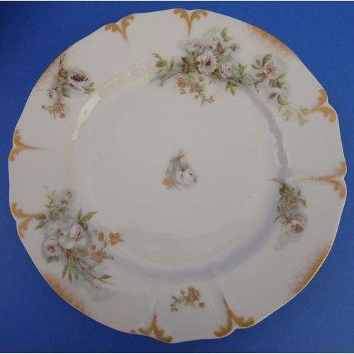 25 - Eleven fine Limoges (France) early 20th century plates decorated with white roses and various other ... 