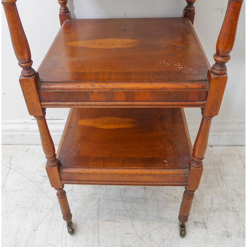 354 - A reproduction yew-wood three-tier whatnot of pleasing colour and proportions: baluster turned uprig... 