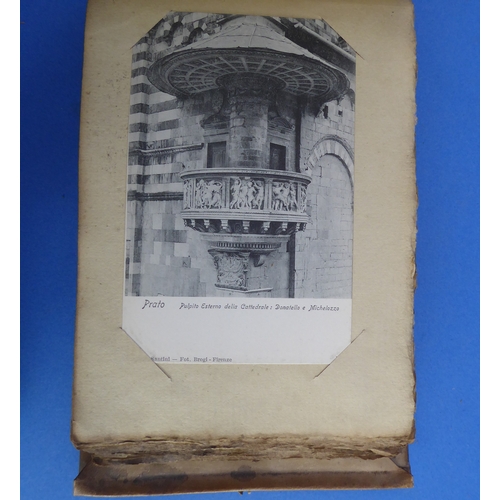 193 - A vellum-bound postcard album containing a selection of colour and monochrome postcards to include V... 