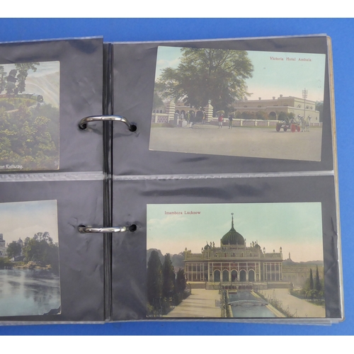 193 - A vellum-bound postcard album containing a selection of colour and monochrome postcards to include V... 