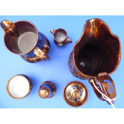 11 - A small selection of 19th and early 20th century Welsh copper lustre to include jugs, a mustard, pep... 