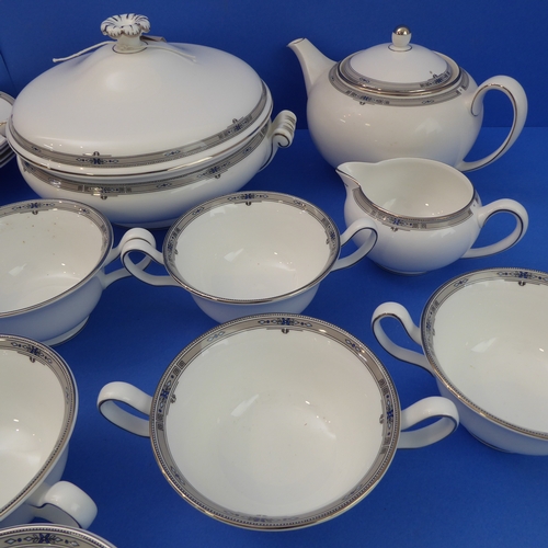 5 - A fine 42-piece Wedgwood bone china six-place dinner service decorated in the 'Amherst' pattern comp... 