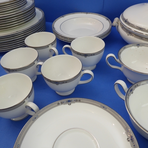 5 - A fine 42-piece Wedgwood bone china six-place dinner service decorated in the 'Amherst' pattern comp... 