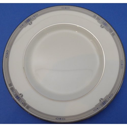 5 - A fine 42-piece Wedgwood bone china six-place dinner service decorated in the 'Amherst' pattern comp... 