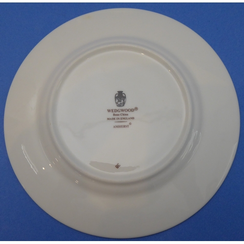 5 - A fine 42-piece Wedgwood bone china six-place dinner service decorated in the 'Amherst' pattern comp... 