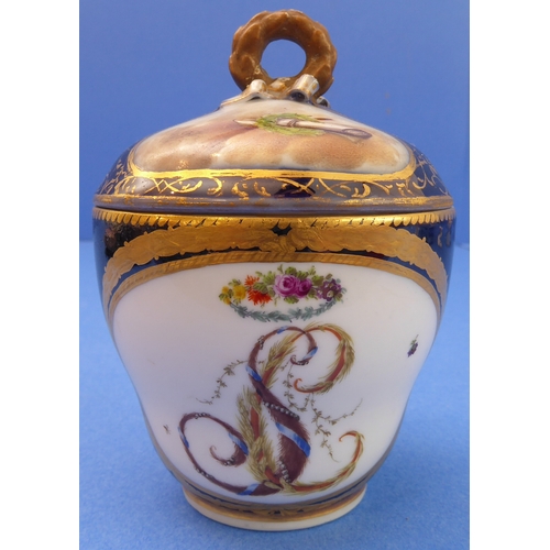 16 - An interesting selection of ceramics to include:
 an early 19th century two-handled Derby boat-shape... 