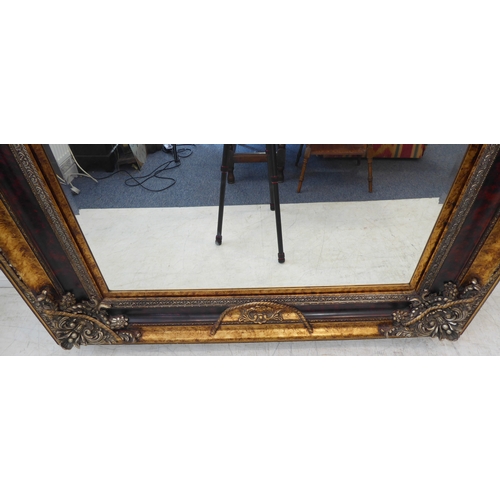 238 - A large and extremally elaborate gilt-framed wall-hanging looking glass in 19th century style (good ... 