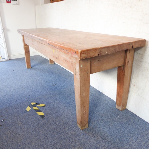 385A - A early 20th century pine farmhouse style kitchen table on square tapering legs (220cm wide x 77cm d... 