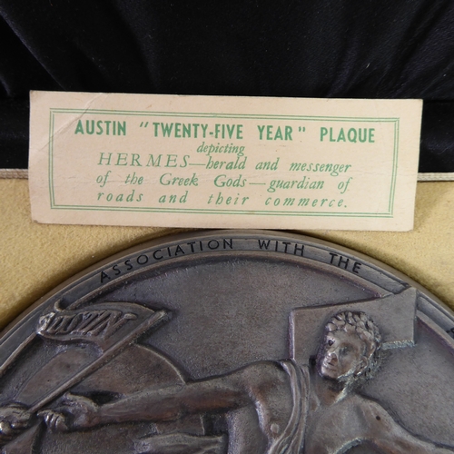 194 - A heavy metal commemorative plaque, the Austin Twenty-Five Year Plaque: obverse with Hermes surround... 