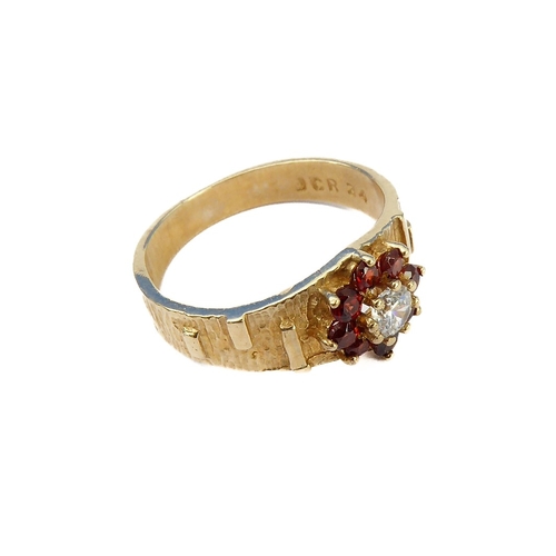 127 - A 9-carat gold and ruby cluster ring, ring size M/N