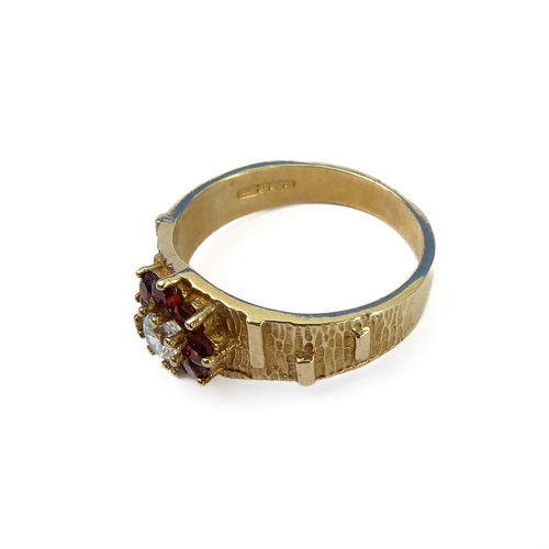 127 - A 9-carat gold and ruby cluster ring, ring size M/N