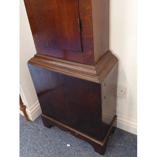 162 - An early 19th century oak-cased eight-day longcase clock: the broken swan-neck pediment above a thir... 