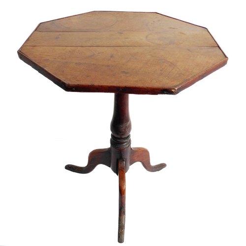 333 - A late 18th/19th century octagonal vernacular oak occasional table: turned stem and tripod base (54c... 