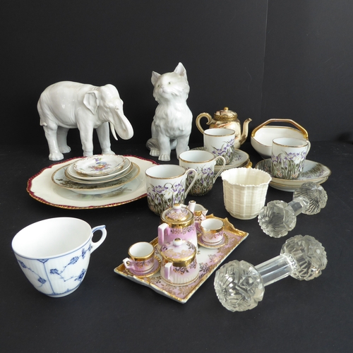 13 - Assorted decorative ceramics and glassware to include:
 a well-modelled Naples-style porcelain eleph... 