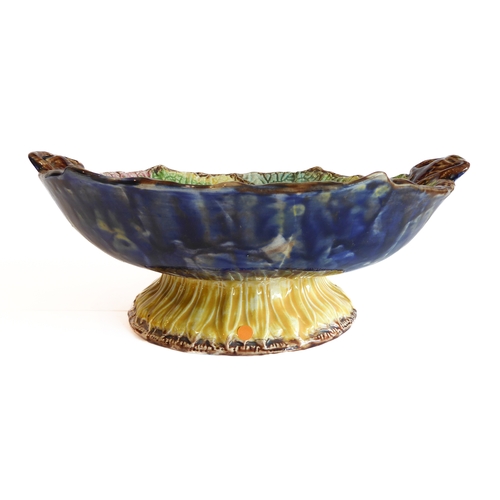 15 - A 19th century two-handled majolica pedestal bowl, together with a pair of early 20th century Veneti... 