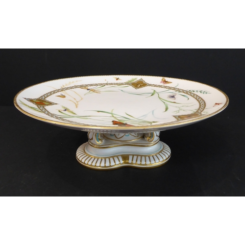 18 - An interesting selection of ceramics to include a pair of 19th century Royal Worcester comports reta... 