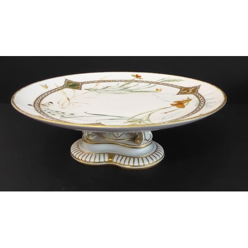 18 - An interesting selection of ceramics to include a pair of 19th century Royal Worcester comports reta... 