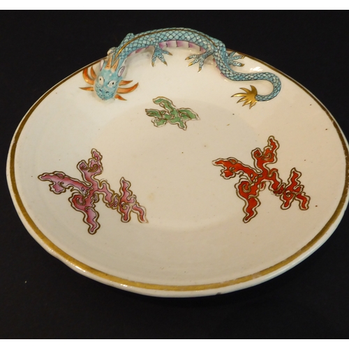 18 - An interesting selection of ceramics to include a pair of 19th century Royal Worcester comports reta... 