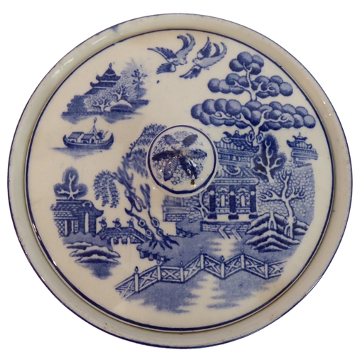 19 - A selection of blue-and-white 'Willow' pattern china to include a covered round dish (Gibson & Son),... 