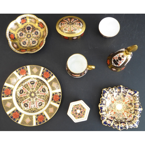 3 - Eight small Royal Crown Derby pieces hand-gilded and decorated in the Imari palette:  
 a flowerhead... 