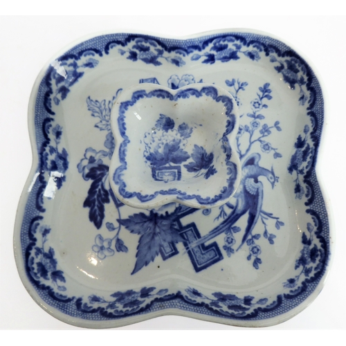 38 - An unusual 19th century blue-and-white pattern oyster server of quatrefoil form and with raised cent... 