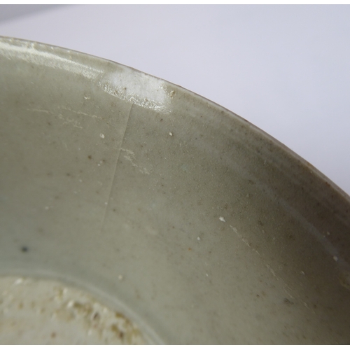 39 - A Chinese porcelain blue and white bowl from the 1822 Tek Sing shipwreck cargo (small chip)