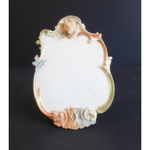 4 - An unusual late 19th century Royal Worcester blushware porcelain menu-holder: surmounted with a fox-... 