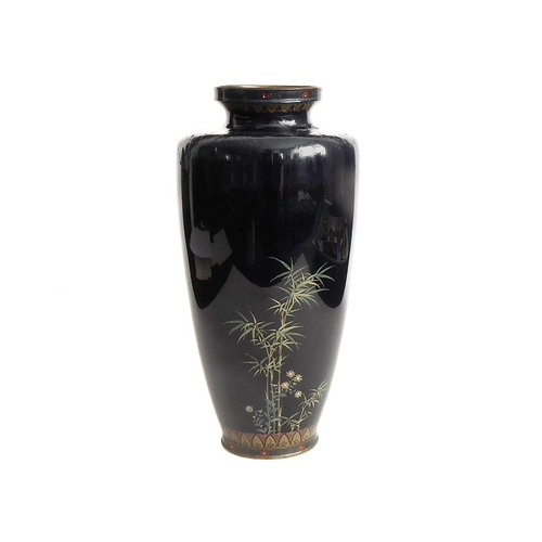 47 - A Japanese cloisonné vase circa 1900; decorated with prunus trees, chrysanthemums and bamboo against... 