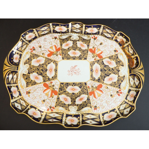 5 - A large Royal Crown Derby porcelain serving tray: hand-gilded and decorated in the Imari palette (pa... 