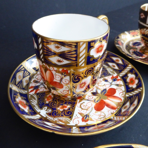 6 - A good selection of Royal Crown Derby ceramics hand-gilded and decorated in the Imari palette to inc... 