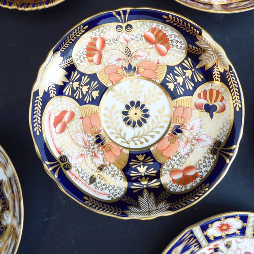 6 - A good selection of Royal Crown Derby ceramics hand-gilded and decorated in the Imari palette to inc... 