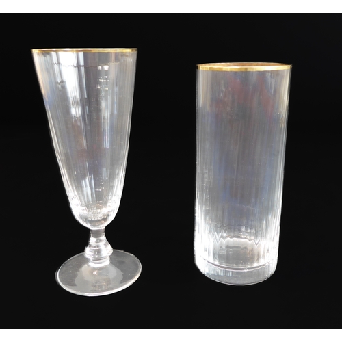 62 - A set of 11 Murano fluted water glasses with gilded rims (14 cm) and three matching wine glasses (15... 