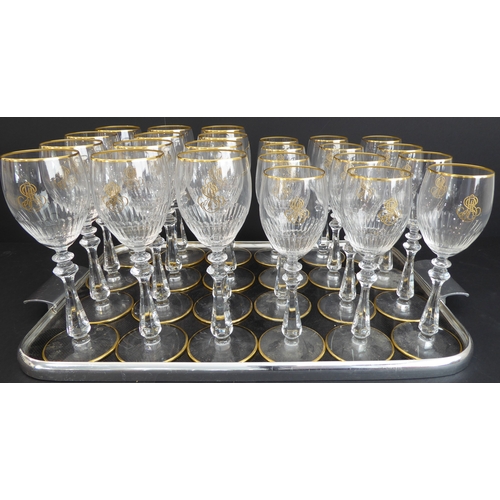 63 - A set of 12 very fine large (21.5m high) and 12 small (20cm high) Baccarat wines with gilded rims, m... 