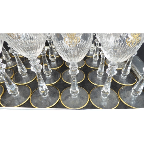 63 - A set of 12 very fine large (21.5m high) and 12 small (20cm high) Baccarat wines with gilded rims, m... 