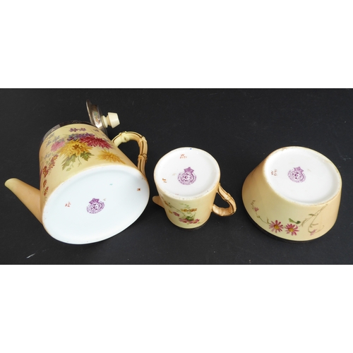 9 - A late 19th century Royal Worcester three-piece bachelor's coffee service: silver-mounted blush porc... 