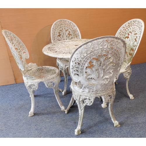 458 - A white-painted aluminium garden set comprising round table and four matching chairs (68.5 cm in dia... 