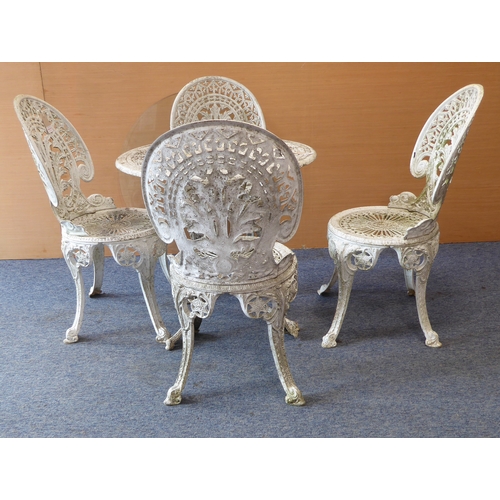 458 - A white-painted aluminium garden set comprising round table and four matching chairs (68.5 cm in dia... 