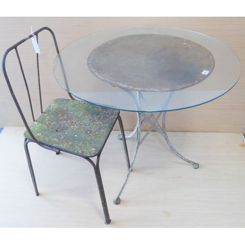 459 - An industrial-style round garden table on tripod base, together with a single heavy iron industrial-... 