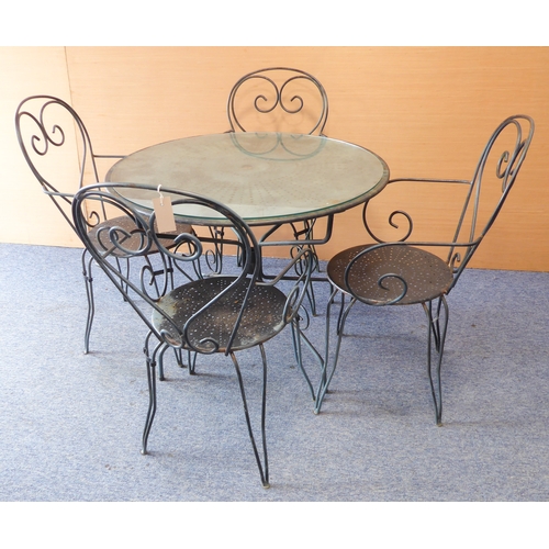 460 - An industrial-style circular metal garden table on four shaped legs and four matching chairs (94.5 c... 