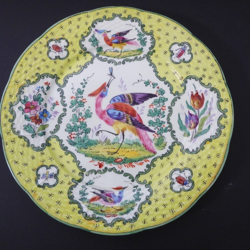 43 - Six porcelain cabinet plates in the Chelsea style (probably continental): white ground with yellow b... 