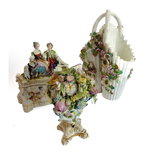 12 - A small ceramic group to include a late 19th century double vase by Moore modelled as flower encrust... 