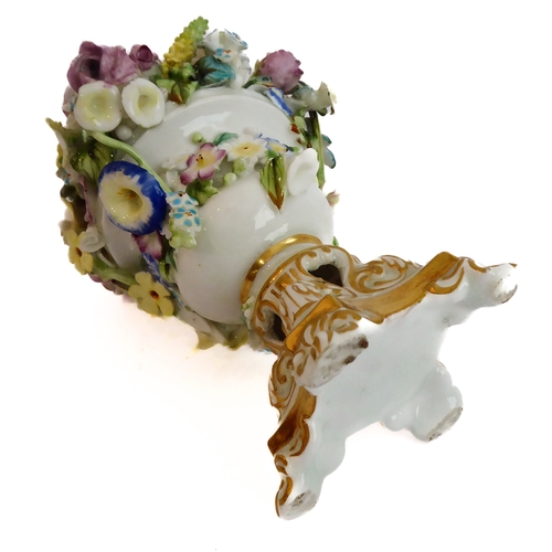 12 - A small ceramic group to include a late 19th century double vase by Moore modelled as flower encrust... 