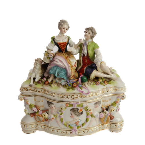 12 - A small ceramic group to include a late 19th century double vase by Moore modelled as flower encrust... 