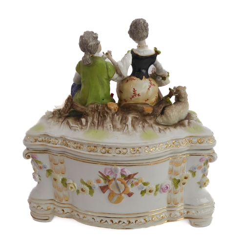 12 - A small ceramic group to include a late 19th century double vase by Moore modelled as flower encrust... 