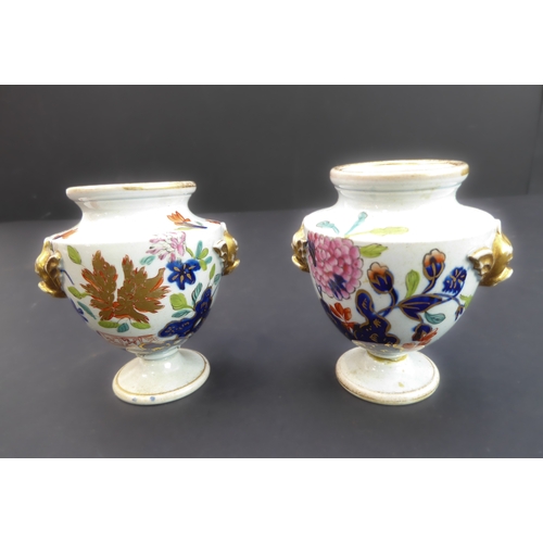 25 - A group of four comprising:
 a pair of early 19th century urn-style vases hand-gilded and decorated ... 