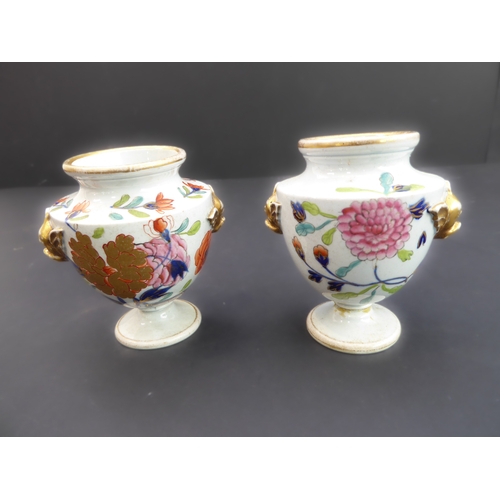 25 - A group of four comprising:
 a pair of early 19th century urn-style vases hand-gilded and decorated ... 