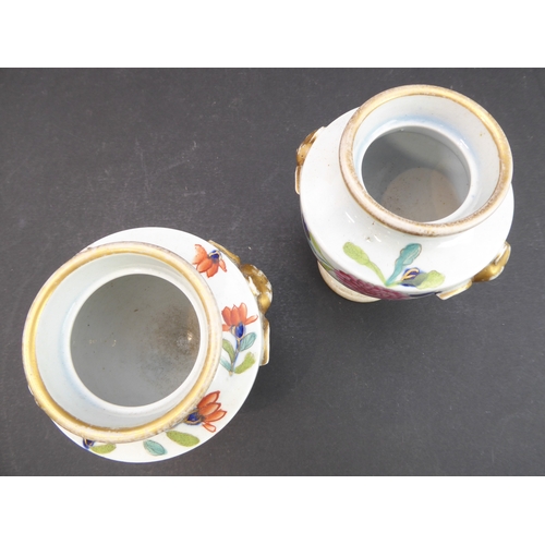 25 - A group of four comprising:
 a pair of early 19th century urn-style vases hand-gilded and decorated ... 