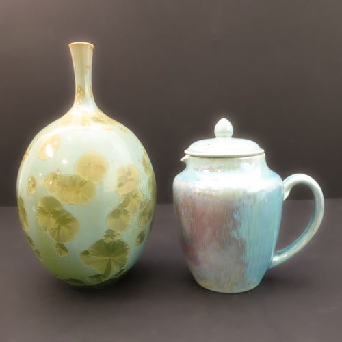 27 - A Ruskin Pottery jug-and-cover with lustreware-style glaze. Together with an unusual studioware styl... 