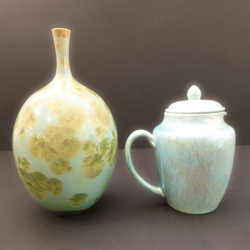 27 - A Ruskin Pottery jug-and-cover with lustreware-style glaze. Together with an unusual studioware styl... 
